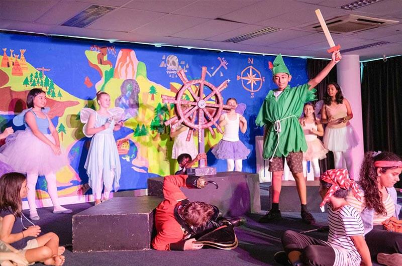 Primary students performing for peter pan performance